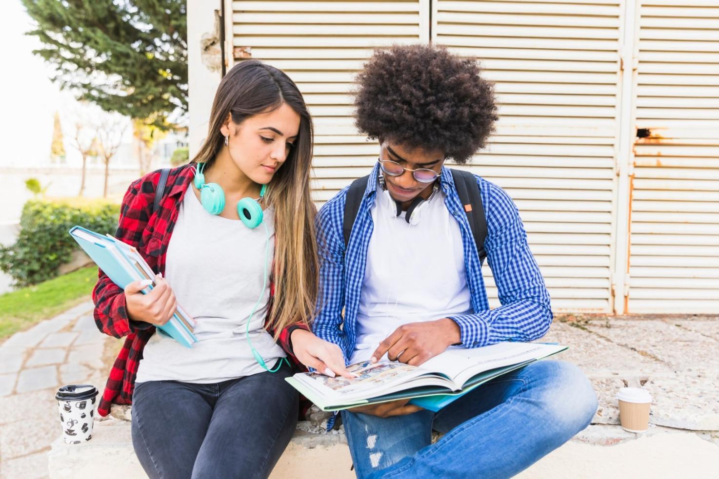 Business owner reviewing financial reports and cash flow forecasts