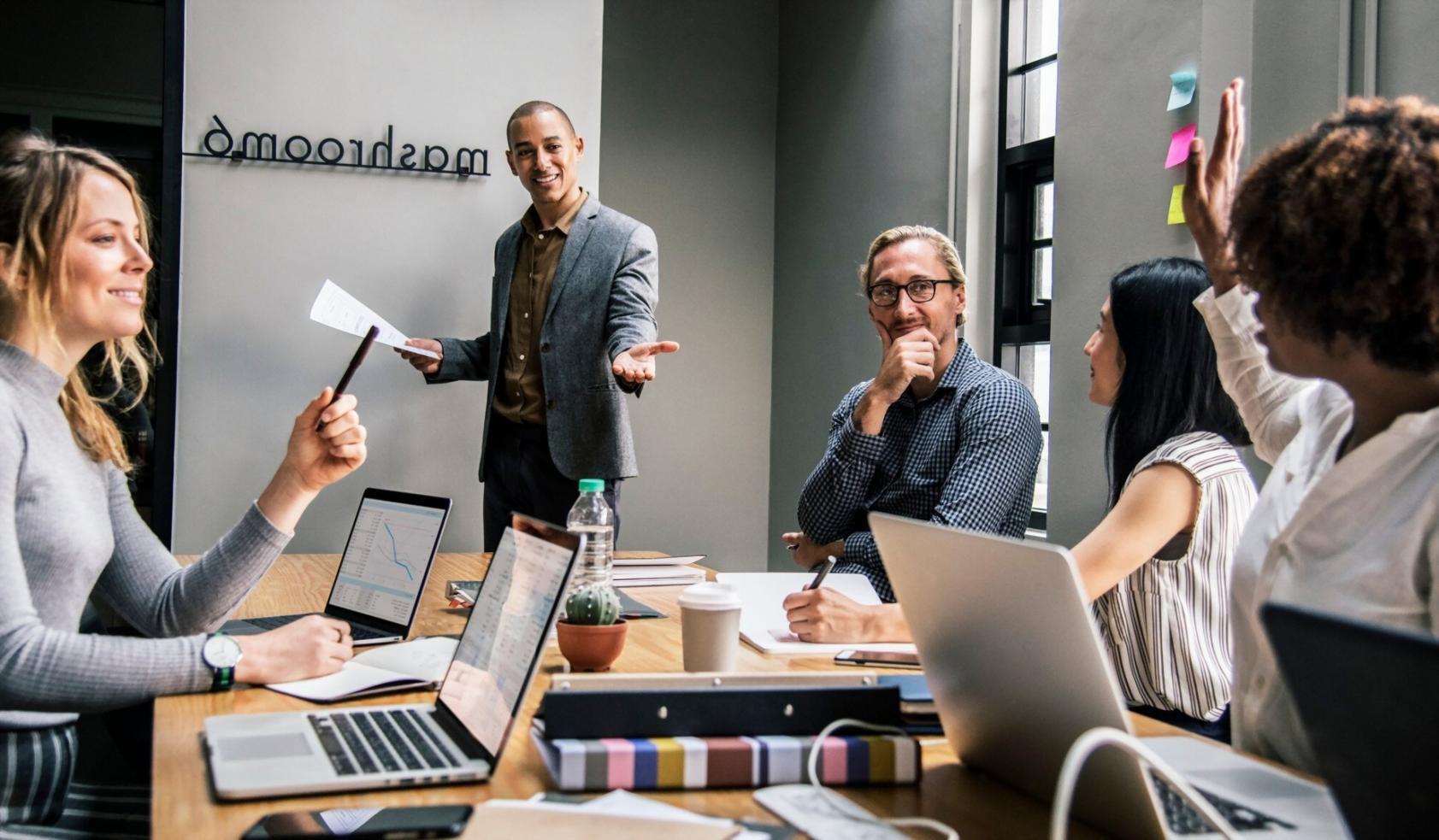 Business meeting discussing financial planning and forecasting strategies